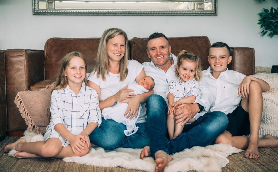 Shock diagnosis: Jay Allen (centre) with his young family. Jay was recently diagnosed with throat cancer. Photo: Supplied.