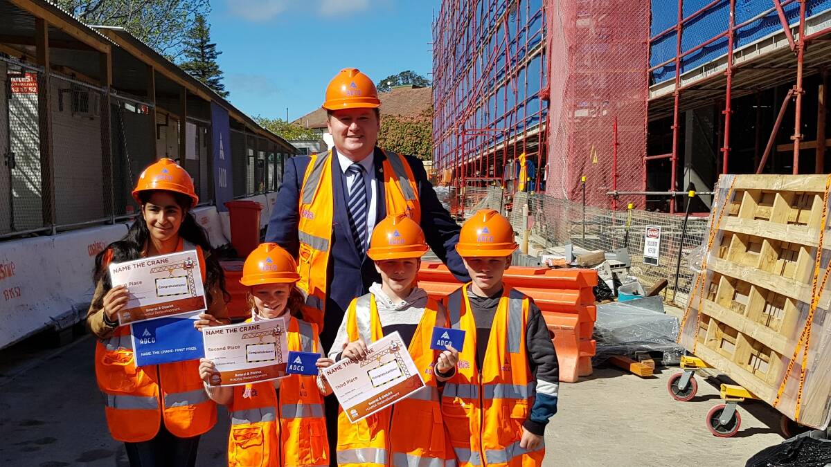 Winners are grinners: Mannat Kaur came first, naming the crane 'Rakhi'. Second place was Ruby Francis and third place was Nicholas James. Photo: supplied. 