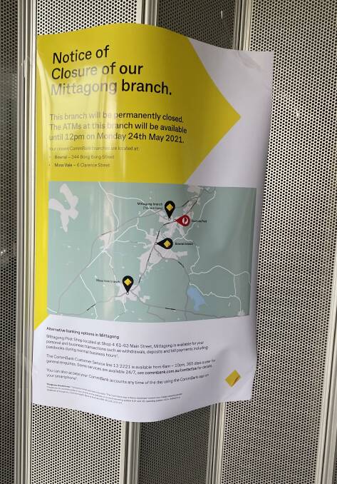 A large sign has been placed inside the Mittagong CBA branch to notify customers of its permanent closure. 
