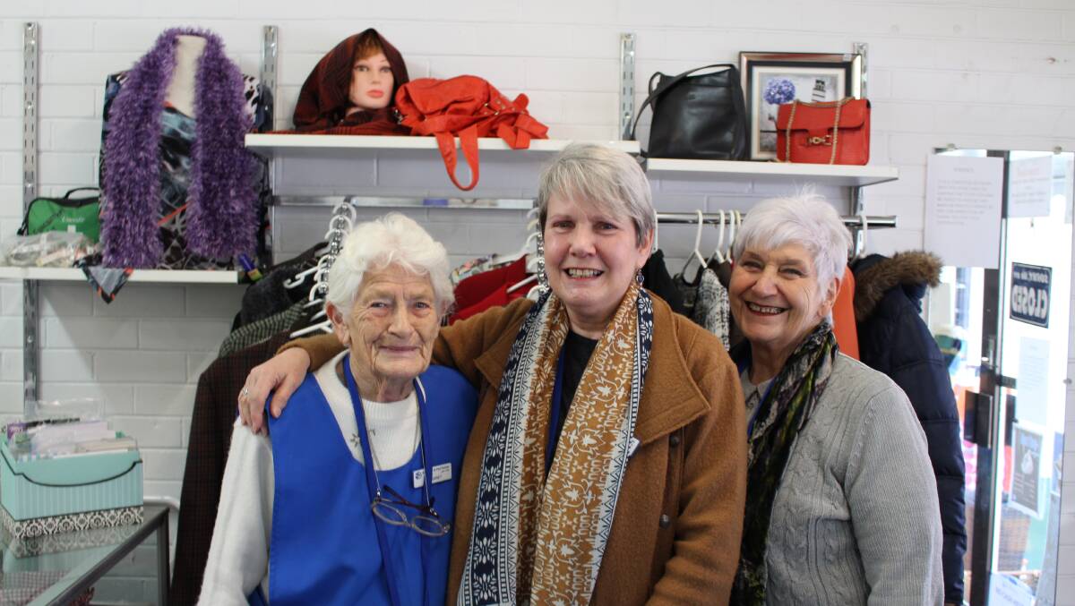 Volunteers Margaret, Isabelle and Robyn from the Bowral St Vincent de Paul's shop said that blankets in good condition were always needed during winter. Photo: Vera Demertzis