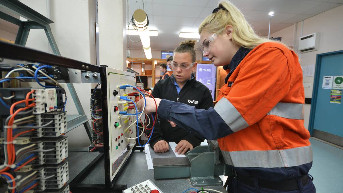 TAFE NSW Electrotechnology Certificate III student Paige Allan with teacher Leonie Davies. Photo: supplied