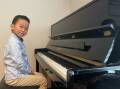 NATURAL TALENT: Kaison Hao is passionate about learning the piano. Picture: supplied.