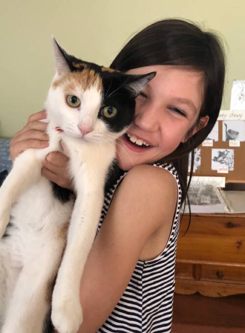 STRENGTH: Lorelei with her beloved cat, Harley, after a successful kidney transplant.