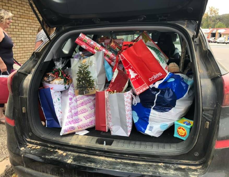 GENEROUS: A boot full of Christmas donations for women and children in need. Photo: Supplied