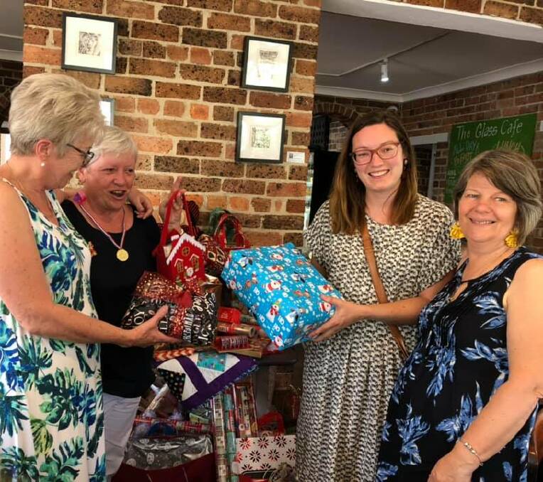 DONATE: On December 10 the Southern Highlands Quilter's Guild gifted presents for SHAW to distribute to women and children in need this Christmas. Photo: Supplied