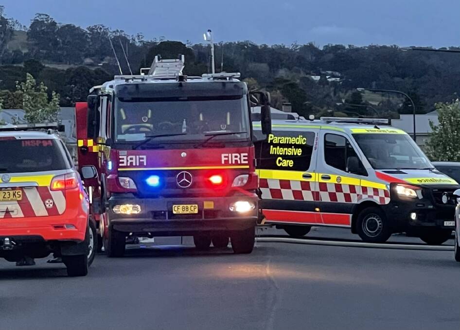 Firefighters and NSW Ambulance on the scene. Photo: FRNSW