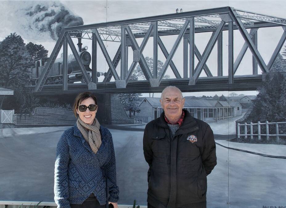 WOW: Angela Macpherson and David Baxter in front of the mural. Photo: Supplied.