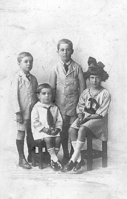 WALKER: siblings Ernie Chester (sitting), William Roger, Matthew Henry and Myee Eunice. Photo: supplied. 