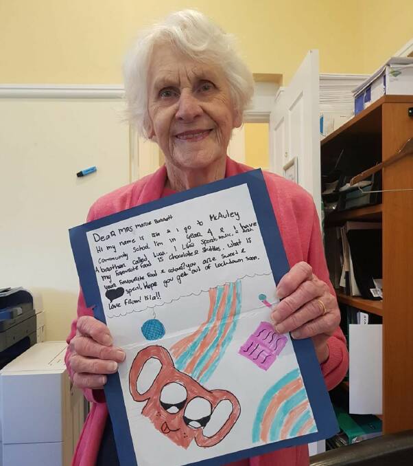 Marie Bennett at Annesley Bowral with her personalised letter from a student in South Australia. Picture: Supplied