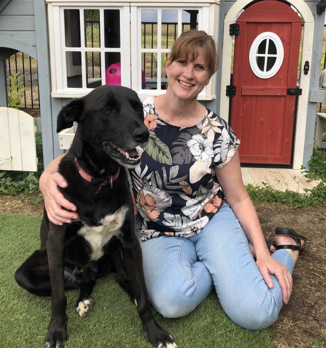 Foster carer Fiona Tollis with her beloved pooch. Photo: Supplied
