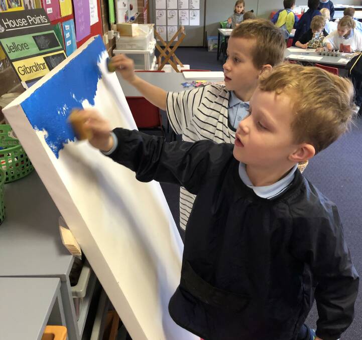 YOUNG ARTISTS: Students have been busy painting at Bowral Public School. Photo: supplied. 