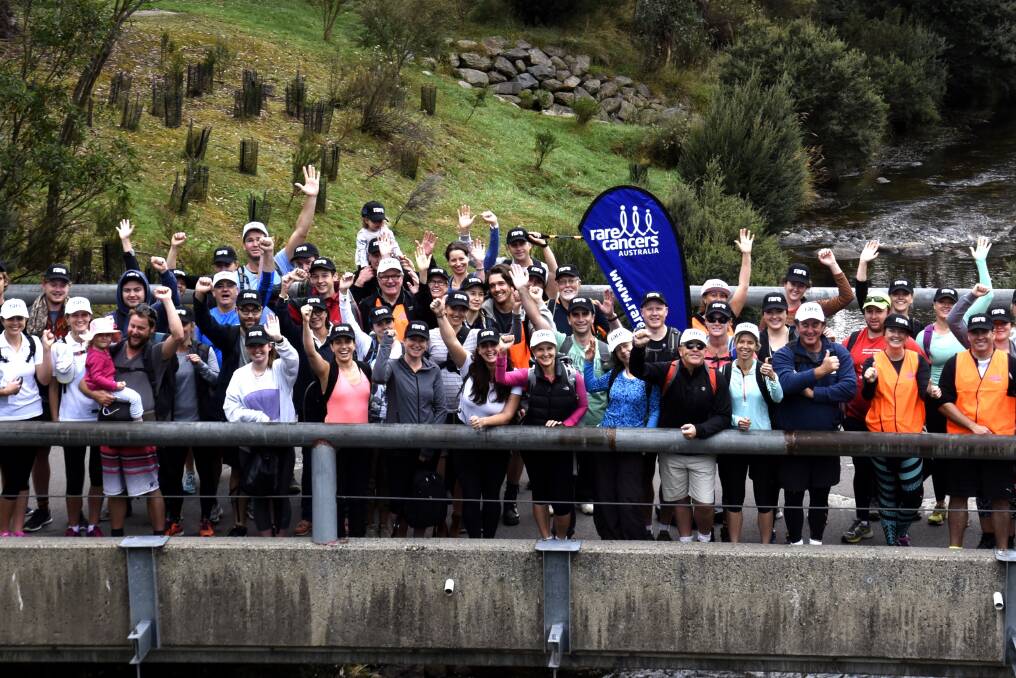 CHALLENGE: 240 people climbed the summit of Mt Kosciuszko  in 2016 to help raise funds and awareness for people diagnosed with rare and less common cancers.Photo by Randy Wieman/Hot Shots Photography