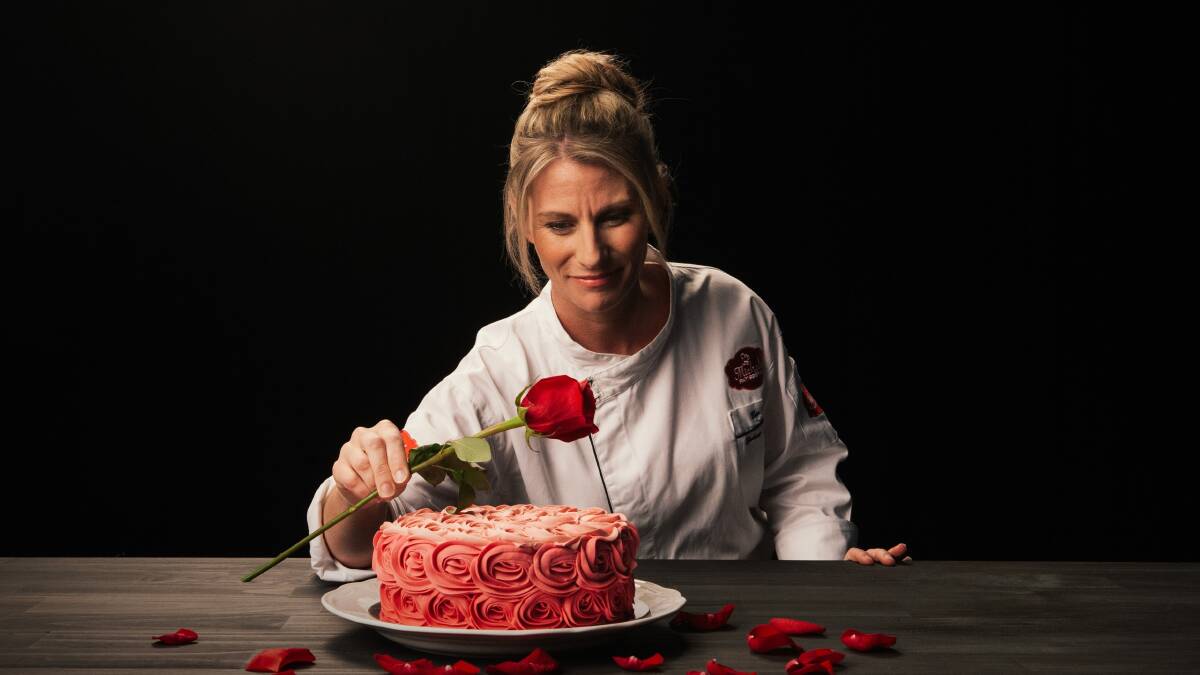 Michel's Patisserie chef Bev Ward puts the finishing touch on one of the new creations which will be featured as part of the Taste of The Great Australian Bake Off range. Photo supplied