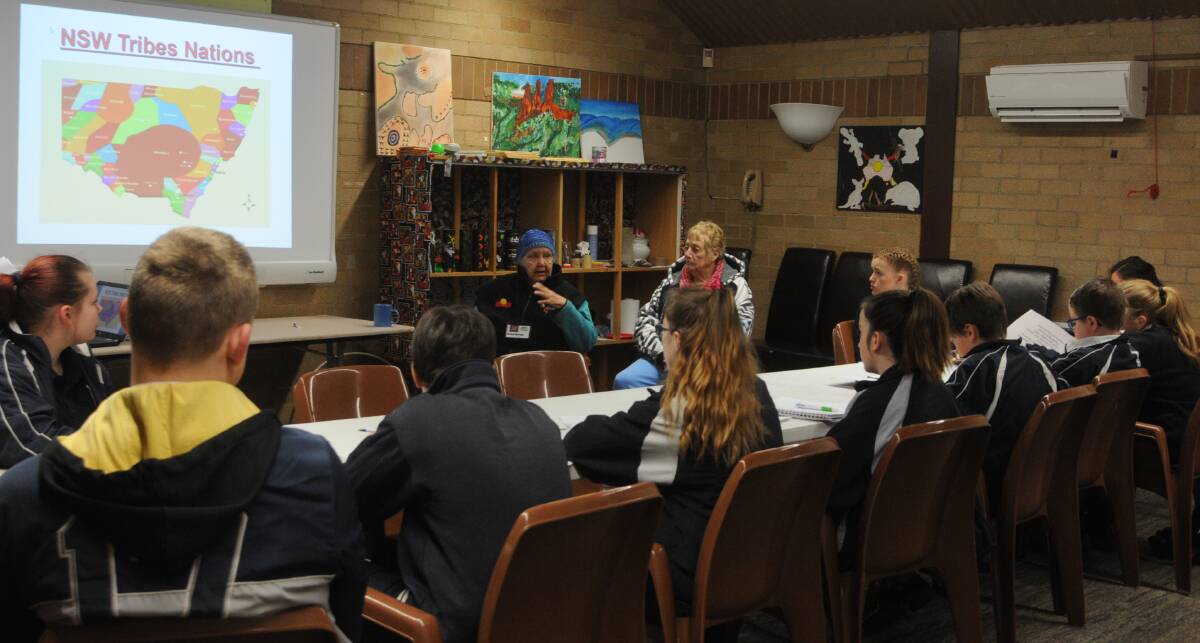 LEARNING THE LANGUAGE: Aunty Val teaches students from Bowral High about about Aboriginal culture. Photo: Lauren Strode
