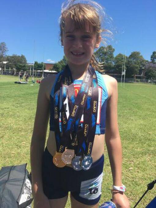 Annabelle Yorke with all her medals from the recent Dapto carnival. Photo supplied