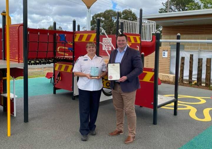 Worthy: Kim Hill receives her award from Wollondilly MP Nathaniel Smith. Picture: Nathaniel Smith/Facebook