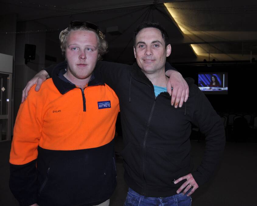 Penny Ackery's campaign manager, Matt Murfitt (right) with supporter Dylan Laker at the Goulburn Workers Club on election night. Photo: Louise Thrower.