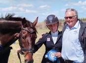 INSPIRATION: Alan Cardy with young equestrian Thea Horsley, whom he awarded the Alan Cardy Encouragement Award at Goulburn's 2016 Lynton Horse Trials. Mr Cardy died on Sunday. Photo supplied. 