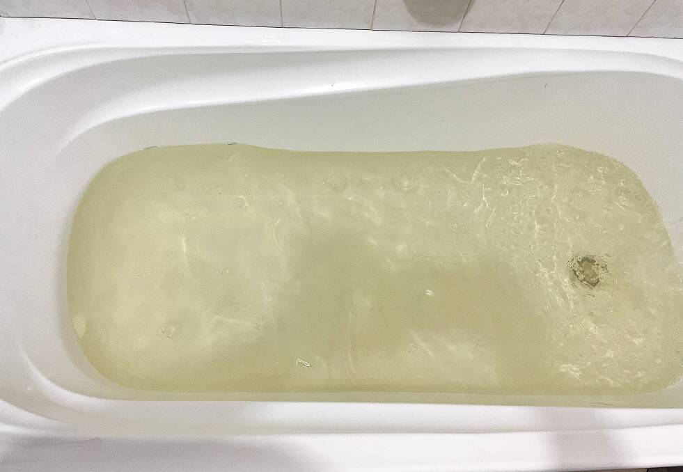 Marulan resident Kelly Vinken says baths and basins are soon stained yellow by the town's tap water. Photo supplied.