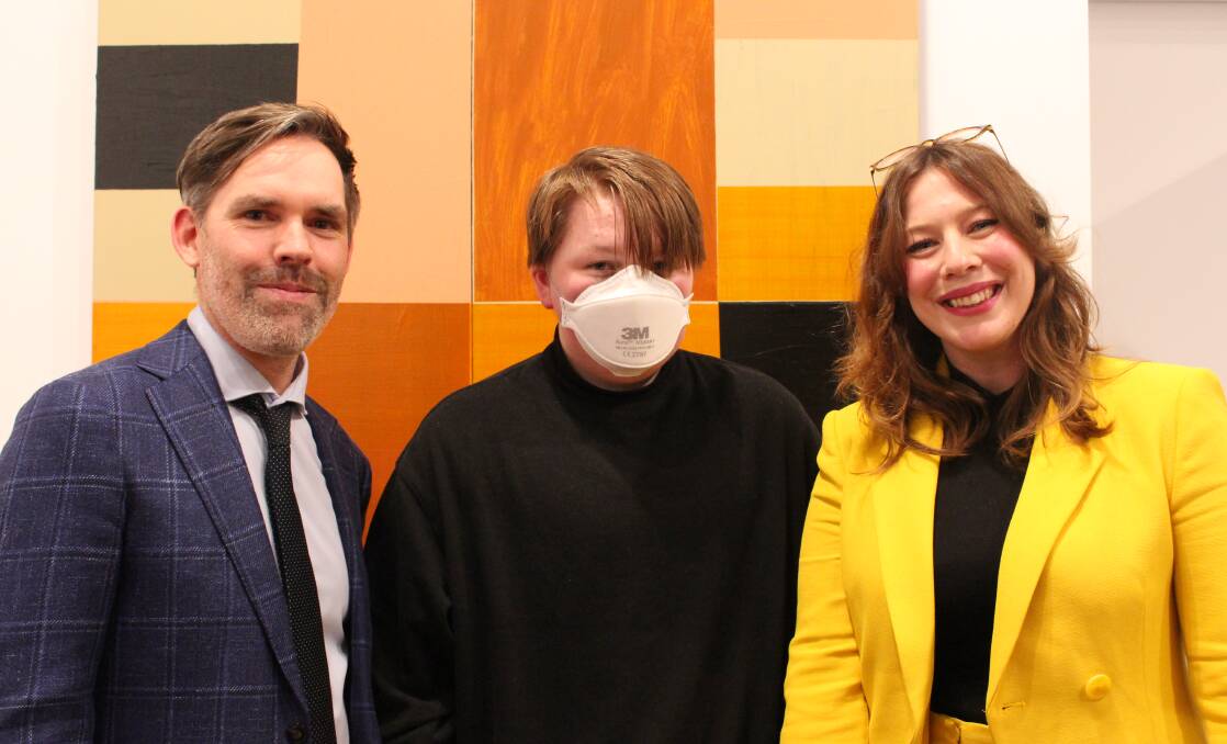 Goulburn Art Prize judge Danny Lacy and Goulburn Regional Art Gallery director Yvette Dal Pozzo congratulated Nolan O'Flynn on his Young Artist's win. Photo: GRAG.