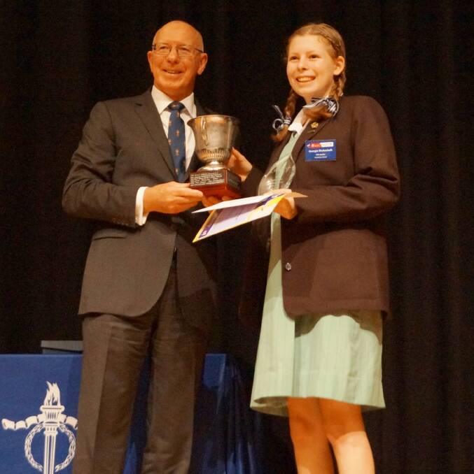 Georgia Shakeshaft receiving her first place trophy from the Governor of New South Wales, His Excellency General The Honourable David Hurley.
