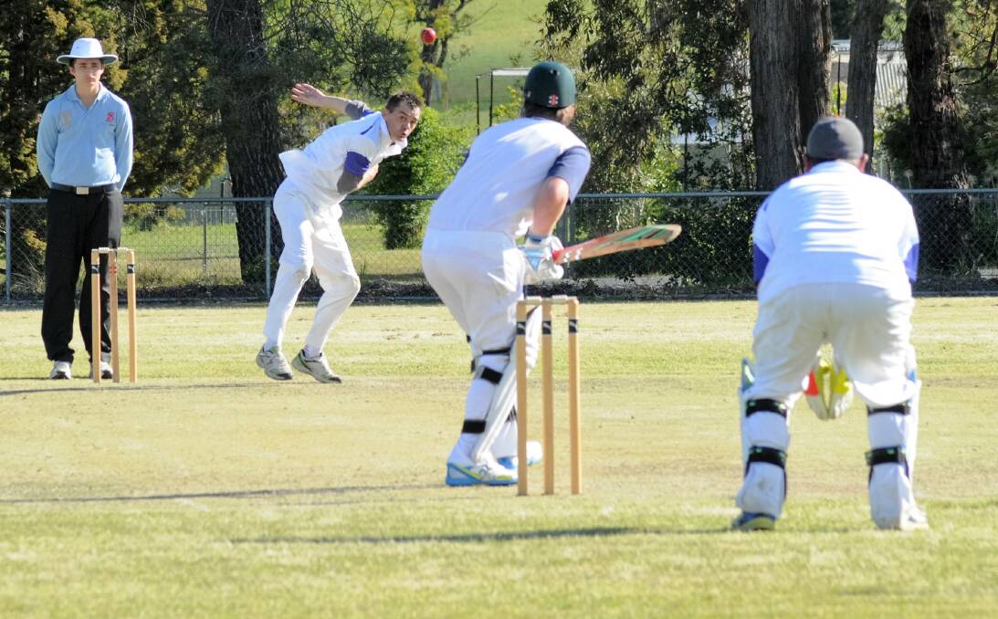 SECOND ROUND: Terry Nash bowls for the East Bowral Blues, who were defeated by seven wickets in the second grade match against Robertson-Burrawang. Photo: Madeline Crittenden. 