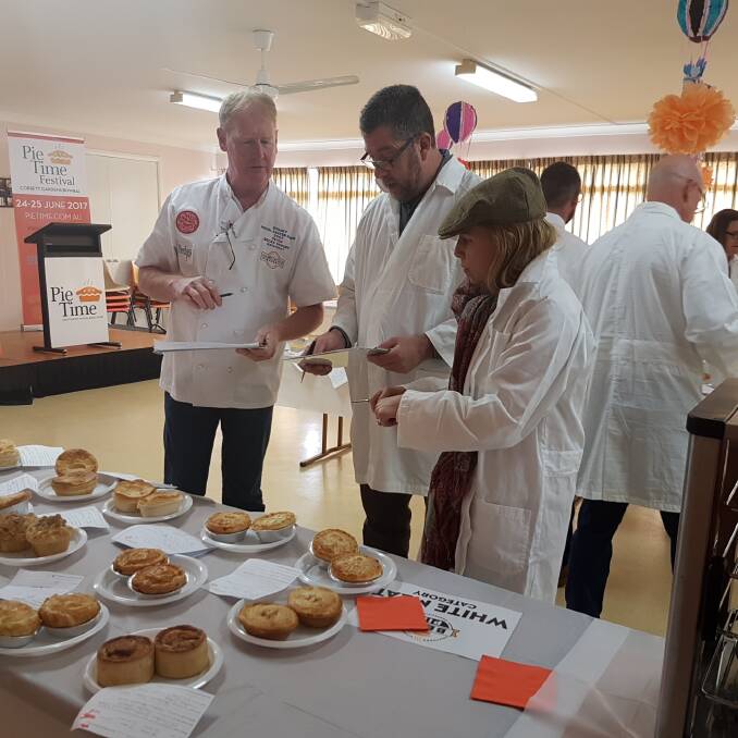 Judges tasting the entries at the 2017 Best Pie competition. 