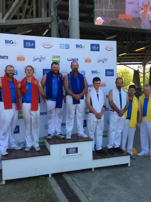 WOOD CHOP WIN: Graham and Ben Shepherd (wearing blue) won the Father-Son Wood Chop at the 2017 Sydney Royal. Photo: supplied. 