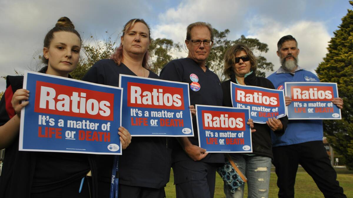 FED UP: Members of the NSW Nurses and Midwives’ Association Wingecarribee Health Service Branch stand together to push for better patient ratios. Photo: Madeline Crittenden. 