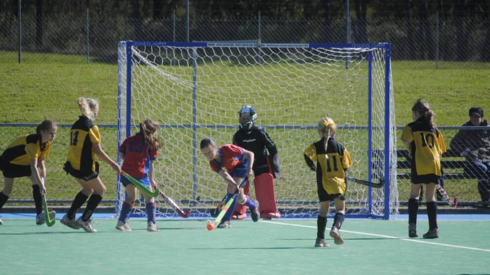 JUNIOR HOCKEY: Action from a junior hockey game between Robertson and Burrawang last year. Photo: Madeline Crittenden. 