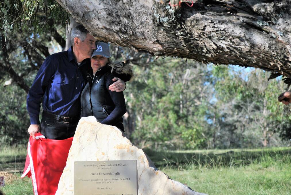FOR OLIVIA: Arthur and Charlotte Inglis unveiling the plaque at the Olivia Inglis Memorial Water Jump. Photo: Madeline Crittenden. 