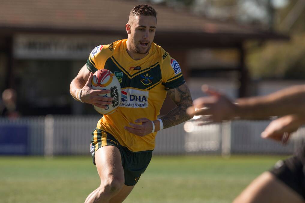 Barry Rutley plays for the Australian Defence Force rugby league team against New Zealand at Wentworthville on Friday, July 7. Picture: Steve Christo