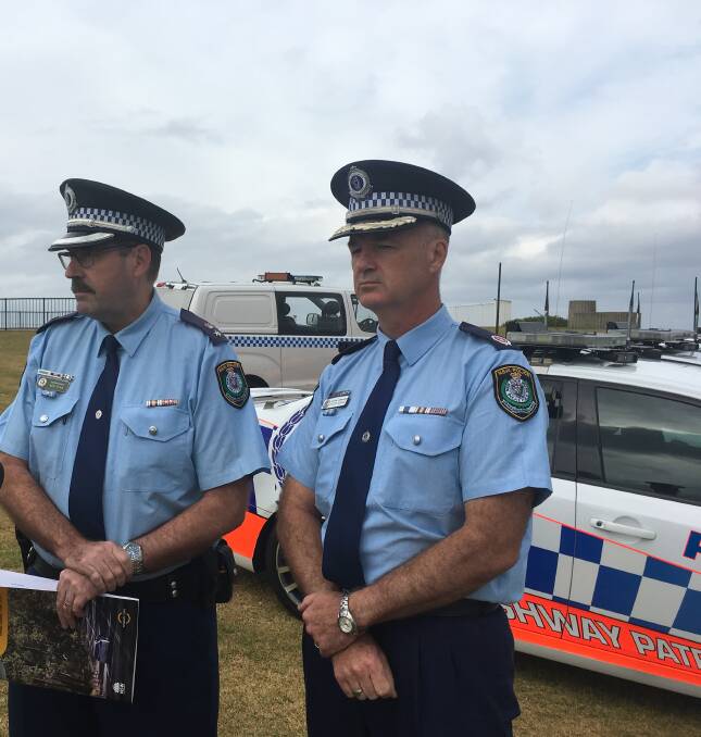 Assistant Commissioner Peter Barrie, Commander of the Southern Region (right), and Superintendent Bob Ryan, Regional Command of the Traffic and Highway Patrol launching Operation Chrome on April 26. 