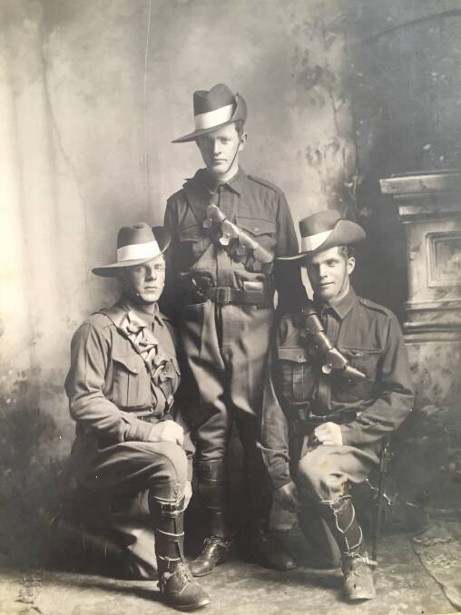 George Gladstone MacDonald, middle, with George Hills, left, and James Wilfred Kenny, right.