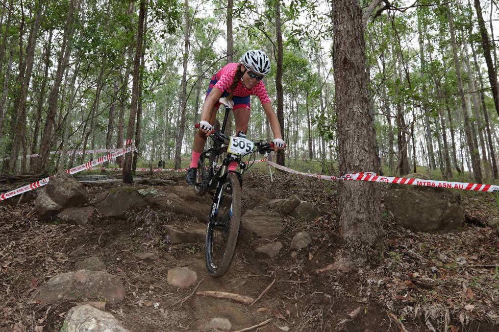 NATIONAL TITLE: Meaghan Stanton nearing the end of her third lap of the Masters 3 Women's race. Photo: Russ Baker. 