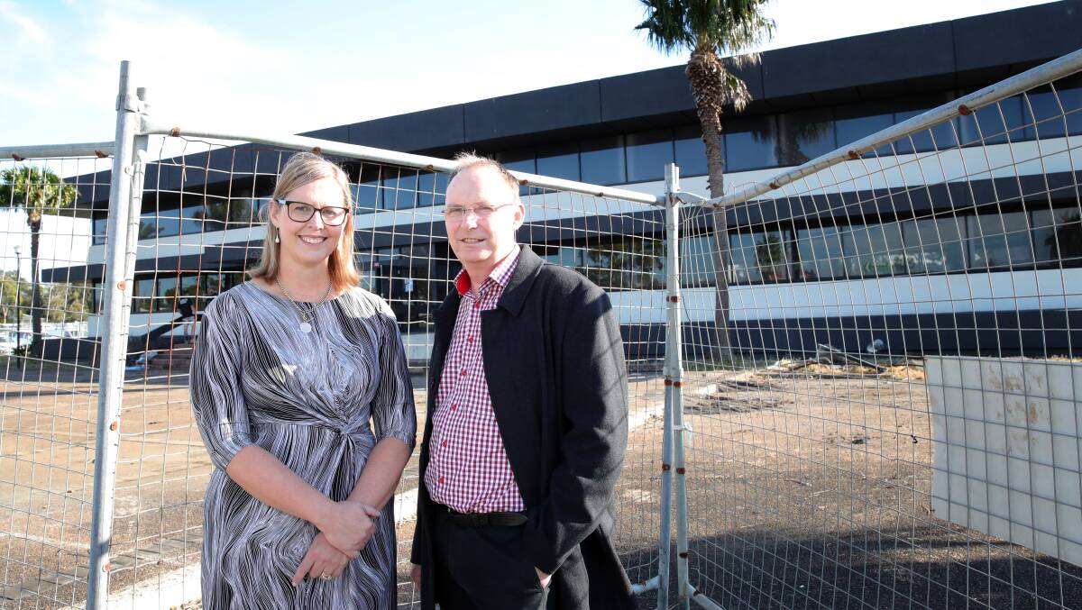 CEO of the South Eastern NSW Primary Health Network Prudence Buist with Grand Pacific Health CEO Adam Phillips outside the building which will be transformed into a new youth and adult mental health service. Picture by Sylvia Liber.