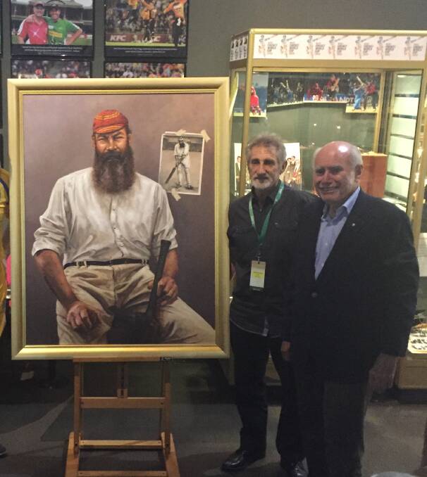 THE BIG REVEAL: Bowral artist Dave Thomas and John Howard unveiled a painting of W. G. Grace at the Bradman Museum on Tuesday. Photos: Emily Bennett