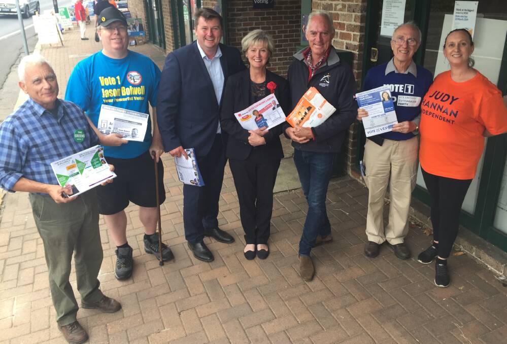State election candidates and their supporters have been out in force at the polls, meeting voters and handing out flyers detailing their ballot paper preferences.