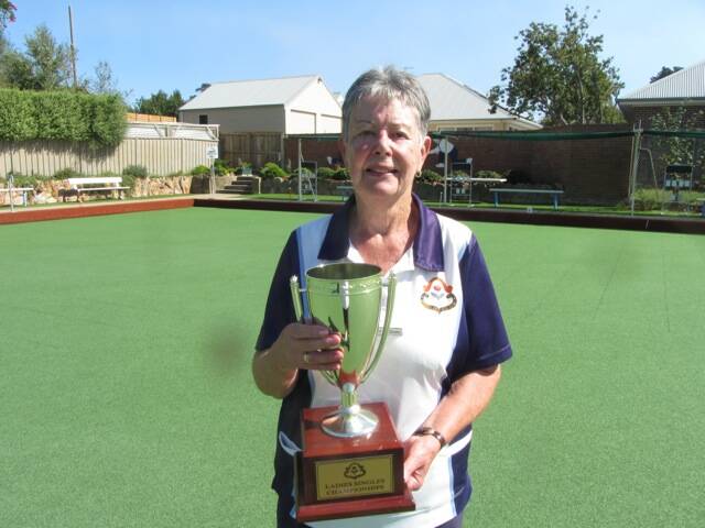 GRINNER: 2018 Club Singles winner Christie Williams with her trophy at Bowral Bowling Club. Photo: Contributed

