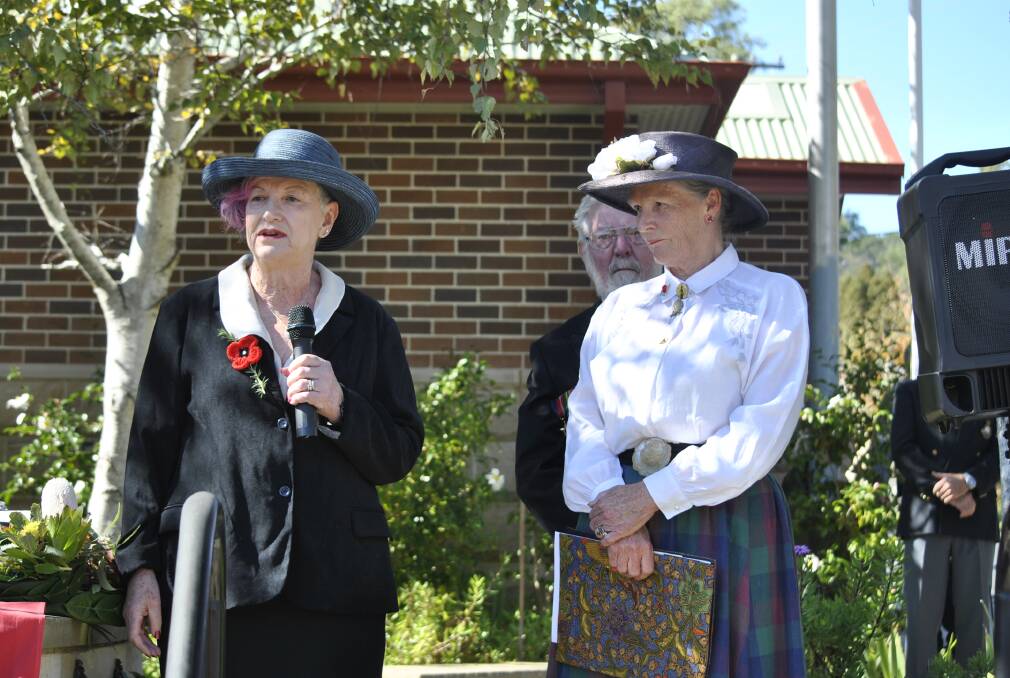 Kangaroo March re-enactment organiser Angela Williamson (right) presented Bundanoon Community Association committee member Christine Janssen with an official plaque during the Bundanoon Anzac Day service. Photo: Emily Bennett