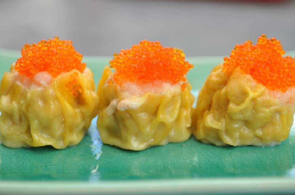 Dumplings with fish roe is just one of the menu items you can order from Catering At Your Place, a business specialising in yum cha, Indian and Vietnamese food.
