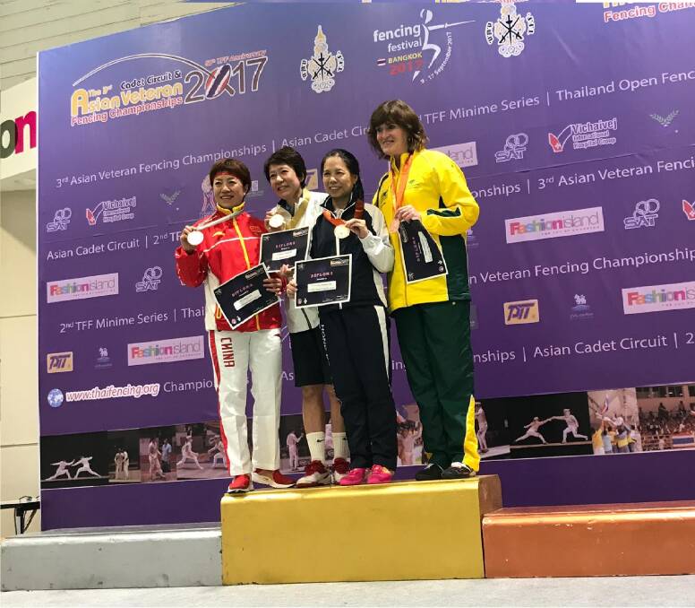 TOP PERFORMANCE: Bundanoon fencer Cathy Syme with the competitors from China, Japan and Hong Kong at the 2017 Asian Veteran Fencing Championships. Photo: Contributed