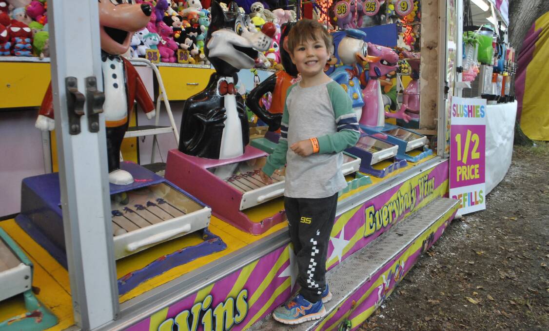 FAMILY FUN: Colo Vale resident Kynan Brasile had a ball in sideshow alley at the Moss Vale Show on Saturday. Photo: Emily Bennett