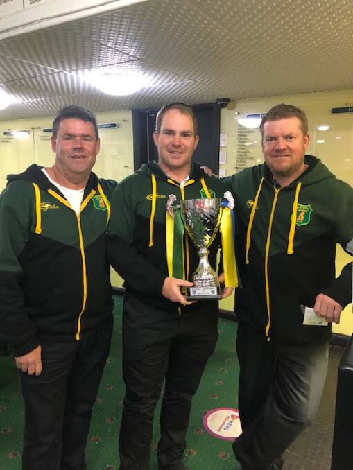 WINNERS: Mittagong Lions manager Matt Aiken, coach Dan Beardshaw and assistant coach Carl Davey with the Corkery-Andrews Cup. Photo: Contributed