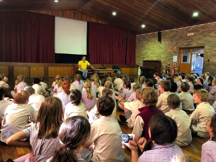 SHARING HIS EXPERIENCE: Para-alpine skier Sam Tait visited his former primary school, St Thomas Aquinas, in Bowral, recently to meet the students and speak about his experience at the Paralympic Games. Photo: Contributed