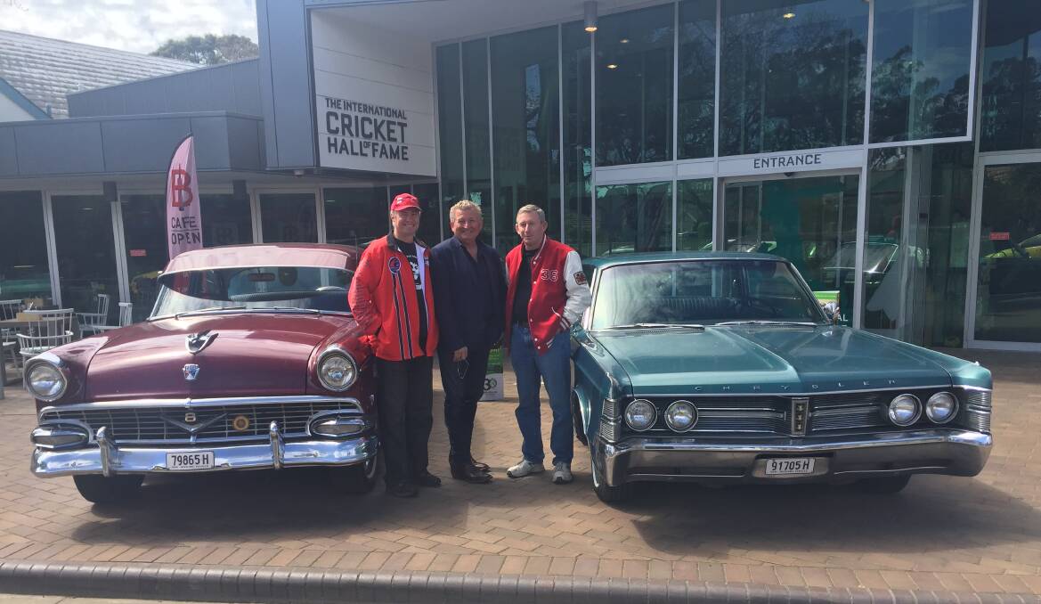REVVED UP: Bowral Cars and Coffee co-organiser Darren Freer, Classic Restos television show host Mark Fletcher and co-organiser Phil Walmsley at the Bradman Museum on Sunday.