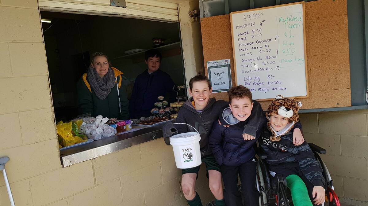 HELPING HAND: Jacqui Ashbolt, Leo Schwarze, Oliver Hunt, Henry Good and Josh Haylock at Ironmines Oval in Mittagong on Saturday. Photo: Supplied