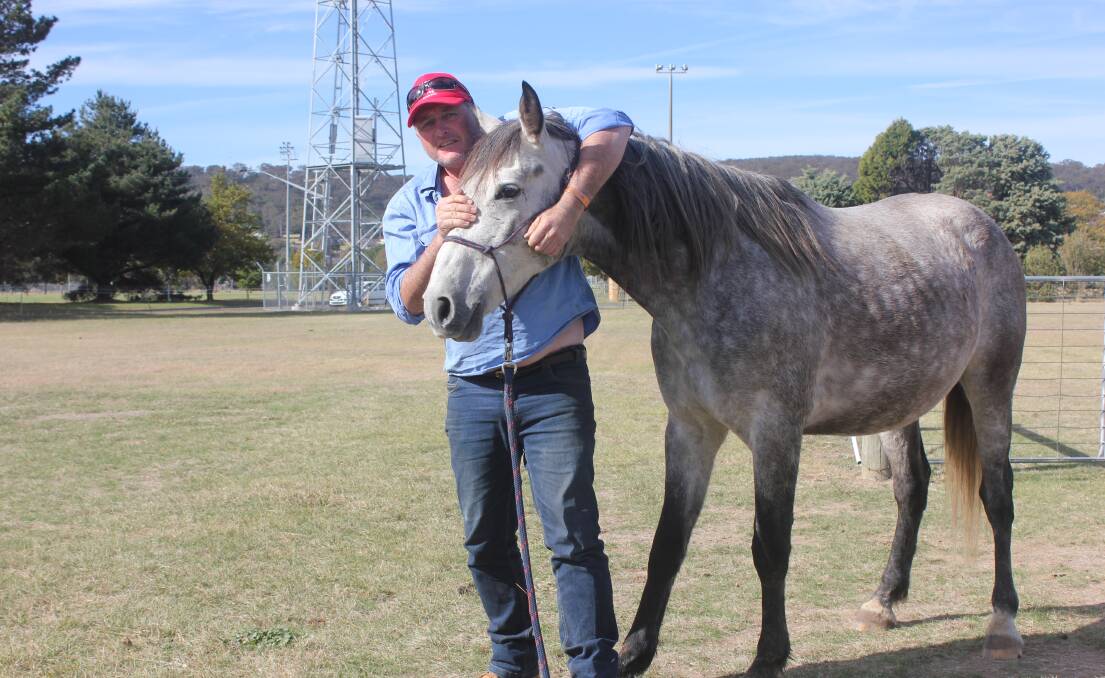 SPECIAL BOND: Mr Hughes and 'Serg' at the Goulburn Pony Club in Goulburn this week. 