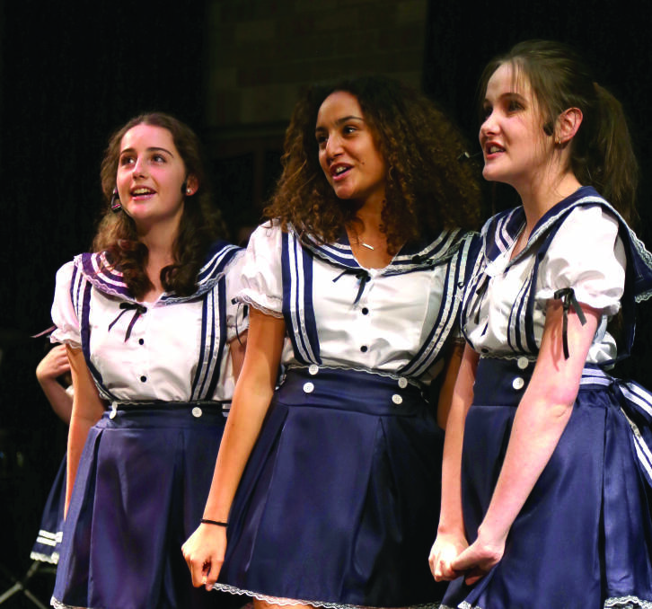 Modern twist: Chevalier College's Aimee Merlino, Tahlia Suares and Victoria Weber play The Three Little Maids in the school's production of 'The Mikado'. Photo: supplied