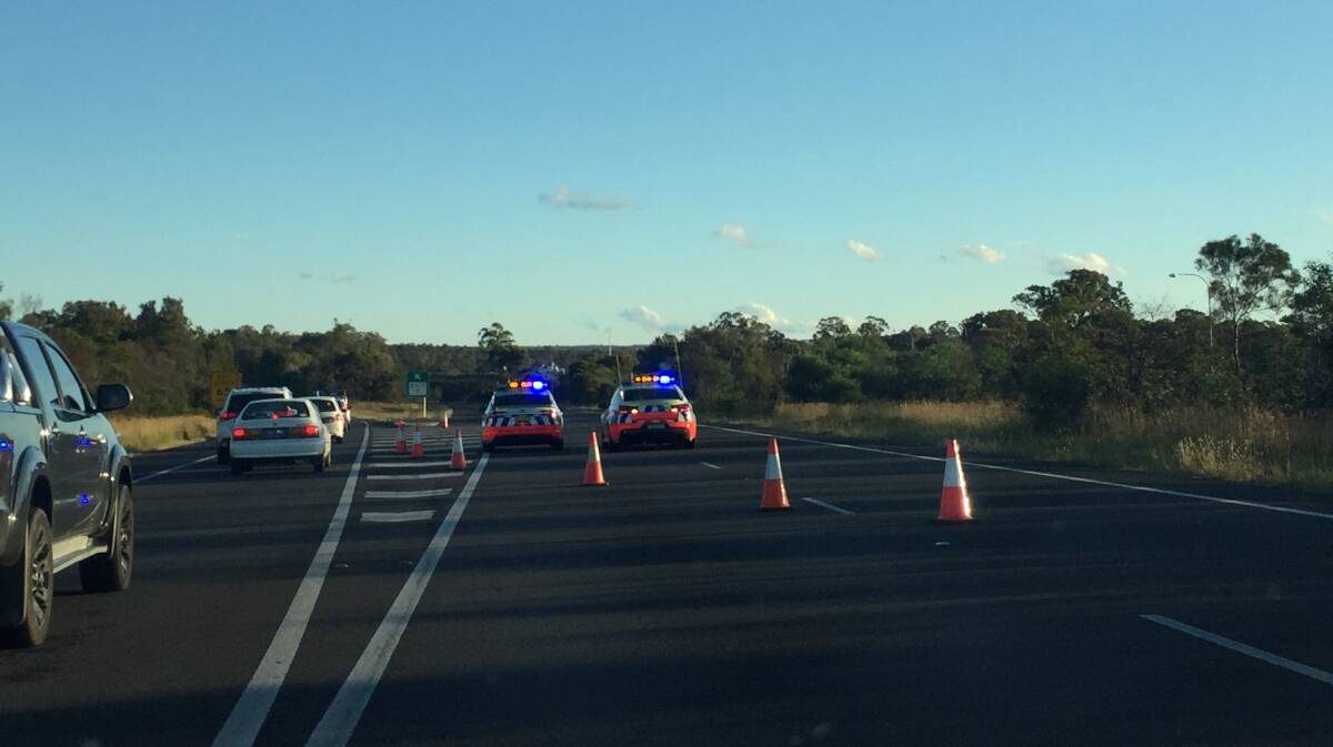 The Hume Highway southbound lane is closed after an accident near Pheasants Nest. Photo: Victoria Lee